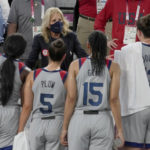 FILE - First lady of the United States Jill Biden talks with the United States team following their women's 3-on-3 basketball game against France at the 2020 Summer Olympics, July 24, 2021, in Tokyo, Japan. (AP Photo/Jeff Roberson, File)