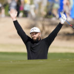 
              Jon Rahm celebrates his eagle out of a sand trap on 15th hole during the second round of the Phoenix Open golf tournament Friday Feb. 10, 2023, in Scottsdale, Ariz. (AP Photo/Darryl Webb)
            