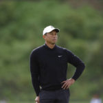 
              Tiger Woods waits for his turn in play during the second round of the Genesis Invitational golf tournament at Riviera Country Club, Friday, Feb. 17, 2023, in the Pacific Palisades area of Los Angeles. (AP Photo/Ryan Kang)
            