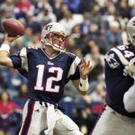 FILE - In this Sept. 30, 2001 file photo, New England Patriots quarterback Tom Brady (12) passes during Brady's first start of an NFL football game against the Indianapolis Colts in Foxborough, Mass.  Brady, who won a record seven Super Bowls for New England and Tampa, has announced his retirement, Wednesday, Feb. 1, 2023.  (AP Photo/Winslow Townson, File)
