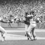 
              FILE -  St. Louis Cardinals pitcher Bob Gibson receives a congratulatory hug from catcher Tim McCarver after he pitched a three-hit, 7-2 victory in Game 7 over the Boston Red Sox to win the 1967 World Series at Fenway Park, on Oct. 12, 1967 in Boston. McCarver, the All-Star catcher and Hall of Fame broadcaster who during 60 years in baseball won two World Series titles with the St. Louis Cardinals and had a long run as the one of the country's most recognized, incisive and talkative television commentators, died Thursday morning, Feb. 16, 2023, in Memphis, Tenn., due to heart failure, baseball Hall of Fame announced. He was 81.  (AP Photo/File)
            