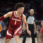 Alabama guard Mark Sears dribbles the ball during the first half of an NCAA college basketball game against South Carolina Wednesday, Feb. 22, 2022, in Columbia, S.C. (AP Photo/Sean Rayford)