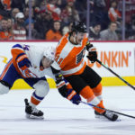 New York Islanders' Jean-Gabriel Pageau, left, and Philadelphia Flyers' Travis Konecny battle for the puck during the second period of an NHL hockey game, Monday, Feb. 6, 2023, in Philadelphia. (AP Photo/Matt Slocum)
