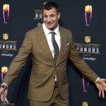 
              FILE - Rob Gronkowski arrives for the NFL Honors in Inglewood, Calif., on Feb. 10, 2022. The four-time Super Bowl winner will host a music festival called “Gronk Beach” in Phoenix on Saturday, Feb. 11, 2023, a day ahead of the Super Bowl. (AP Photo/Marcio Jose Sanchez, File)
            