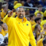 Michigan head coach Juwan Howard yells from the sideline during the second half of an NCAA college basketball game against Michigan State, Saturday, Feb. 18, 2023, in Ann Arbor, Mich. (AP Photo/Carlos Osorio)