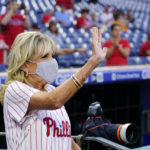 FILE - First lady Jill Biden waves while participating in the Philadelphia Phillies' sixth annual "Childhood Cancer Awareness Night" before a baseball game against the Washington Nationals, Sept. 9, 2022, in Philadelphia. (AP Photo/Matt Slocum, File)