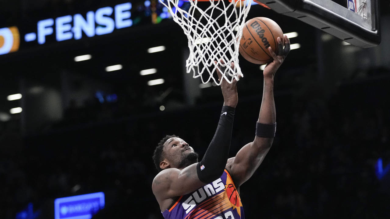 Phoenix Suns center Deandre Ayton goes to the basket during the second half of an NBA basketball ga...