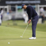 
              Tiger Woods putts on the second green during the first round of the Genesis Invitational golf tournament at Riviera Country Club, Thursday, Feb. 16, 2023, in the Pacific Palisades area of Los Angeles. (AP Photo/Ryan Kang)
            