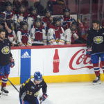 The Ukraine Select peewee team watch the Montreal Canadiens warmup before an NHL hockey game against the Chicago Blackhawks Tuesday, Feb. 14, 2023 in Montreal. (Ryan Remiorz/The Canadian Press via AP)