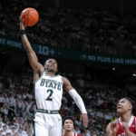 
              Michigan State's Tyson Walker shoots against Indiana's Malik Reneau during the second half of an NCAA college basketball game Tuesday, Feb. 21, 2023, in East Lansing, Mich. (AP Photo/Al Goldis)
            