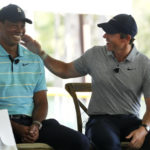 
              Golfers Tiger Woods, left, and Rory McIlroy share a laugh as they discuss the future home of their tech-infused golf league that will begin play next year, Tuesday, Feb. 21, 2023, on the campus of Palm Beach State College in Palm Beach Gardens, Fla. (AP Photo/Wilfredo Lee)
            