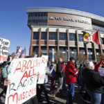 FILE - A "No Honor in Racism Rally" marches in front of TCF Bank Stadium before an NFL football game between the Minnesota Vikings and the Kansas City Chiefs, on Oct. 18, 2015, in Minneapolis. The group objects to the Kansas City Chiefs name, and other teams' use of Native Americans as mascots. As the Kansas City Chiefs return to Super Bowl on Sunday, Feb. 12, 2023, for the first time in two years, the movement to change their name and logo will be there again. (AP Photo/Alex Brandon, File)
