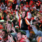 Kansas City Chiefs fans celebrate their team's win at the end of the NFL Super Bowl 57 football game against the Philadelphia Eagles during a watch party in the Power and Light entertainment district in Kansas City, Mo., Sunday, Feb. 12, 2023. (AP Photo/Colin E. Braley)