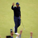 
              Tiger Woods acknowledges the gallery after a birdie putt on the 18th hole during the first round of the Genesis Invitational golf tournament at Riviera Country Club, Thursday, Feb. 16, 2023, in the Pacific Palisades area of Los Angeles. (AP Photo/Ryan Kang)
            