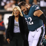 FILE - First lady Jill Biden talks with Philadelphia Eagles center Jason Kelce (62) before the coin toss before an NFL football game against the Dallas Cowboys, Oct. 16, 2022, in Philadelphia. (AP Photo/Rich Schultz, File)