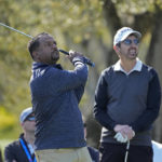 
              Alfonso Ribeiro, left, follows his shot from a tee as Ray Romano looks on during the celebrity challenge event of the AT&T Pebble Beach Pro-Am golf tournament in Pebble Beach, Calif., Wednesday, Feb. 1, 2023. (AP Photo/Eric Risberg)
            