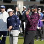 Larry Fitzgerald reacts as Josh Allen, left, looks on during the putting challenge event of the AT&T Pebble Beach Pro-Am golf tournament in Pebble Beach, Calif., Wednesday, Feb. 1, 2023. (AP Photo/Eric Risberg)
