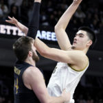 
              Purdue center Zach Edey, right, shoots over Northwestern center Matthew Nicholson during the first half of an NCAA college basketball game in Evanston, Ill., Sunday, Feb. 12, 2023. (AP Photo/Nam Y. Huh)
            