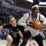 
              Mississippi forward Tyia Singleton (22) fights off a steal attempt by South Carolina guard Brea Beal (12) during the first half of an NCAA college basketball game in Oxford, Miss., Sunday, Feb. 19, 2023. (AP Photo/Rogelio V. Solis)
            