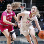 
              Michigan State's Matilda Ekh, right, drives against Maryland's Faith Masonius during the first half of an NCAA college basketball game, Saturday, Feb. 18, 2023, in East Lansing, Mich. (AP Photo/Al Goldis)
            