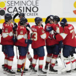 
              Florida Panthers goaltender Sergei Bobrovsky, far right, is congratulated by teammates after the Panthers beat the San Jose Sharks 4-1 in an NHL hockey game, Thursday, Feb. 9, 2023, in Sunrise, Fla. (AP Photo/Wilfredo Lee)
            