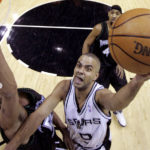 
              FILE - San Antonio Spurs guard Tony Parker (9), of France, drives to the basket as Minnesota Timberwolves guard Markoi Jaric (55) defends during the first quarter of their NBA basketball game in San Antonio, Jan. 6, 2006. Parker was announced Friday, Feb. 17, 2023, as being among the finalists for enshrinement later this year by the Basketball Hall of Fame. The class will be revealed on April 1. (AP Photo/Eric Gay, File)
            