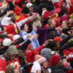 
              Fans do the tomahawk chop during the Kansas City Chiefs' victory celebration and parade in Kansas City, Mo., Wednesday, Feb. 15, 2023, following the Chiefs' win over the Philadelphia Eagles Sunday in the NFL Super Bowl 57 football game. (AP Photo/Reed Hoffmann)
            