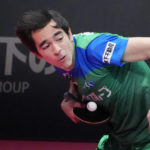 Brazil's Hugo Calderano tosses the ball to serve as he competes during a WTT tournament table tennis match, Sunday, Feb. 12, 2023, in Kawasaki, near Tokyo. Calderano is No. 5 in the sport's ranking, he reached No. 3 a year ago, and he's defeated many of the top Chinese including No. 1 Fan Zhendong. (AP Photo/Eugene Hoshiko)