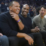 
              Minnesota Timberwolves co-owner Alex Rodriguez, left, talks with former baseball player Barry Bonds before an NBA basketball game between the Golden State Warriors and the Timberwolves in San Francisco, Sunday, Feb. 26, 2023. (AP Photo/Jeff Chiu)
            