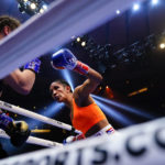 
              FILE - Amanda Serrano punches Ireland's Katie Taylor during the fourth round of a lightweight championship boxing match on April 30, 2022, in New York. Serrano's next fight comes Saturday, Feb. 4, 2023, where she can become undisputed featherweight champion with a victory over Erika Cruz, the main event on a female-filled card at Madison Square Garden. (AP Photo/Frank Franklin II, File)
            