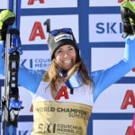 
              Italy's Marta Bassino celebrates winning an alpine ski, women's World Championships super G, in Meribel, France, Wednesday, Feb. 8, 2023. (AP Photo/Marco Trovati)
            