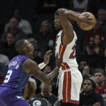 
              Charlotte Hornets guard Terry Rozier (3) defends against Miami Heat forward Jimmy Butler (22) during the first half of an NBA basketball game, Saturday, Feb. 25, 2023, in Charlotte, N.C. (AP Photo/Matt Kelley)
            