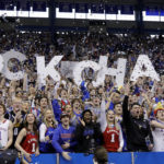 
              Kansas fans react before an NCAA college basketball game against Baylor, Saturday, Feb. 18, 2023, in Lawrence, Kan. (AP Photo/Colin E. Braley)
            