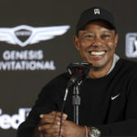 
              FILE -  Tiger Woods speaks during a news conference for the Genesis Invitational golf tournament at Riviera Country Club, Wednesday, Feb. 16, 2022, in the Pacific Palisades area of Los Angeles. Woods is back at Riviera, this time with more on his plate than handing out the trophy in the Genesis Invitational. He returns to the PGA Tour for the first time since July. (AP Photo/Ryan Kang, File)
            