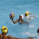 
              Youth team players warm-up ahead of the Black star water polo competition held at the University of Ghana in Accra, Saturday, Jan. 14, 2023. Former water polo pro Prince Asante is training young players in the sport in his father's homeland of Ghana, where swimming pools are rare and the ocean is seen as dangerous. (AP Photo/Misper Apawu)
            