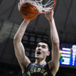 
              Purdue center Zach Edey (15) get a basket on a dunk against Penn State during the second half of an NCAA college basketball game in West Lafayette, Ind., Wednesday, Feb. 1, 2023. Purdue defeated Penn State 80-60. (AP Photo/Michael Conroy)
            