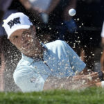 
              Eric Cole hits from a bunker onto the third green during the final round of the Honda Classic golf tournament, Sunday, Feb. 26, 2023, in Palm Beach Gardens, Fla. (AP Photo/Lynne Sladky)
            