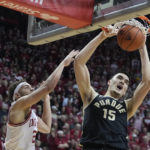 
              Purdue's Zach Edey (15) dunks against Indiana's Race Thompson (25) during the first half of an NCAA college basketball game, Saturday, Feb. 4, 2023, in Bloomington, Ind. (AP Photo/Darron Cummings)
            