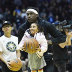 
              Toronto Raptors forward Pascal Siakam lifts up a child during the NBA All-Star 2023 practice at the Huntsman Center, Saturday, Feb. 18, 2023 in Salt Lake City. (Ryan Sun/The Deseret News via AP)
            