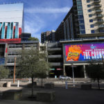 
              Large advertisements adorn buildings and electronic billboards leading up to the NFL Super Bowl LVII football game in Phoenix, Friday, Feb. 3, 2023. (AP Photo/Ross D. Franklin)
            
