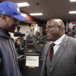 Eric Bieniemy, right, talks with Washington Commanders wide receiver Terry McLaurin, left, after being introduced as the new offensive coordinator and assistant head coach of the Commanders, after a, NFL football press conference in Ashburn, Va., Thursday, Feb. 23, 2023. (AP Photo/Luis M. Alvarez)