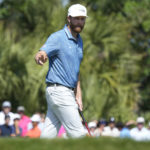 
              Chris Kirk acknowledges the gallery after a birdie putt on the first hole during the final round of the Honda Classic golf tournament, Sunday, Feb. 26, 2023, in Palm Beach Gardens, Fla. (AP Photo/Lynne Sladky)
            