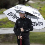 Viktor Hovland, of Norway, waits to putt on the 10th green of the Monterey Peninsula Country Club Shore Course during the second round of the AT&T Pebble Beach Pro-Am golf tournament in Pebble Beach, Calif., Friday, Feb. 3, 2023. (AP Photo/Eric Risberg)