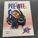 
              The International Peewee Tournament program features a female player on its cover in honor of the event launching a girls’ division for the first time in its 63 year history. Tournament GM Patrick Dom said the growth of women’s hockey around the world made this the right time for the tournament to have a girls division, which features 12 teams. Previously, girls were allowed to participate, but either as teams playing in boys divisions or being included on boys’ team rosters. (AP Photo/John Wawrow)
            