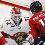 
              Florida Panthers goaltender Sergei Bobrovsky (72) defends the net against Washington Capitals center Nicklas Backstrom (19) during the third period of an NHL hockey game, Thursday, Feb. 16, 2023, in Washington. (AP Photo/Nick Wass)
            