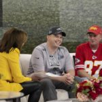 
              In this image provided by NBC News’ TODAY, Philadelphia Eagles fan Billy Welsh, center, and Kansas City Chiefs fan John Gladwell, right, speak with TODAY co-anchor Hoda Kotb together during a broadcast of the show, Wednesday, Feb. 8, 2023, in New York. The two former Marines bonded by a kidney donation and their love of football are now headed to the Super Bowl. Gladwell donated a kidney to Welsh two years ago after Welsh was diagnosed with polycystic kidney disease. (Nathan Congleton/NBC News’ TODAY via AP)
            