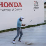 
              Chris Cole hits from a bunker onto the 18th green during the final round of the Honda Classic golf tournament, Sunday, Feb. 26, 2023, in Palm Beach Gardens, Fla. (AP Photo/Lynne Sladky)
            