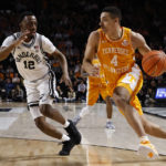 
              Tennessee guard Tyreke Key (4) drives against Vanderbilt guard Trey Thomas (12) during the first half of an NCAA college basketball game Wednesday, Feb. 8, 2023, in Nashville, Tenn. (AP Photo/Wade Payne)
            