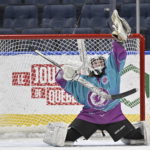 
              Vermont Flames Academy hockey goalie Kaleb Sanderson makes a save against Ukraine at the International Peewee Tournament in Quebec City, Friday, Feb. 17, 2023.  (Jacques Boissinot/The Canadian Press via AP)
            