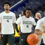 Michigan State University basketball members practice before an NCAA college basketball game against Michigan, Saturday, Feb. 18, 2023, in Ann Arbor, Mich. (AP Photo/Carlos Osorio)